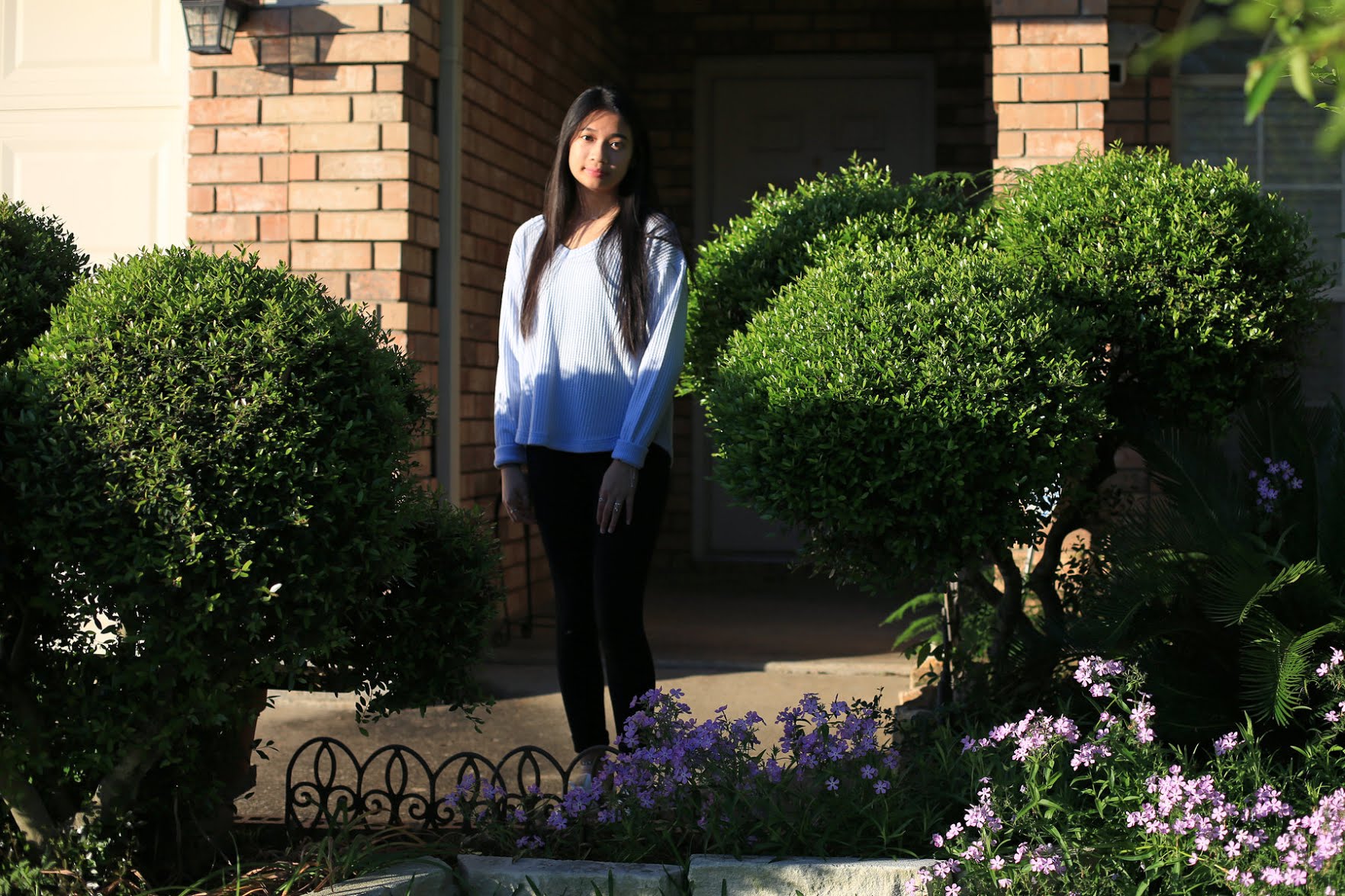 Mary Nguyen of Arlington, Texas, is one of many high school seniors who changed their college plans to stay closer to home.